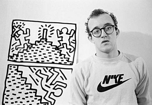 Keith Haring with one of his drawing series, photographed in January 1982 by Joseph Szkodzinski.