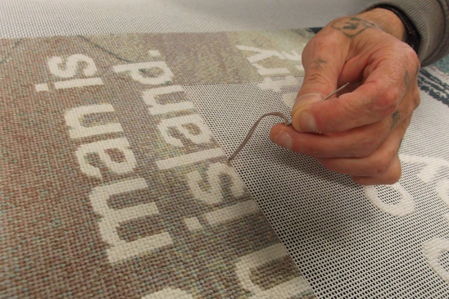 Stitchers working on Wolfgang Tillmans’ No Man is an Island (2019).