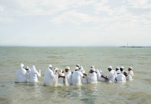 Mass Baptism, Southend-on-Sea (detail) (2013) in ‘Thames Log’ by Chloe Dewe Mathews. © Chloe Dewe Mathews