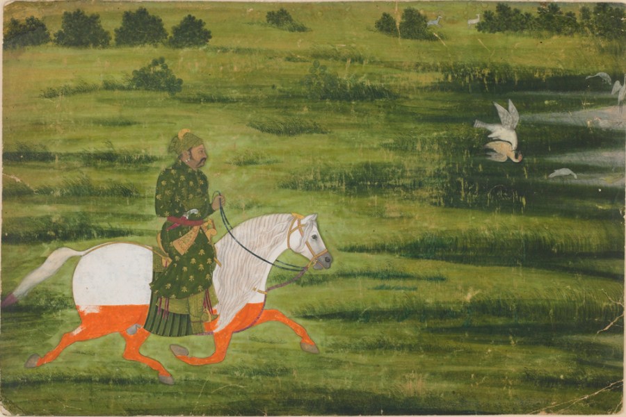 A mounted man hunting birds with a falcon (early 18th century), Kishangarh, Rajasthan state, India, Mughal dynasty.